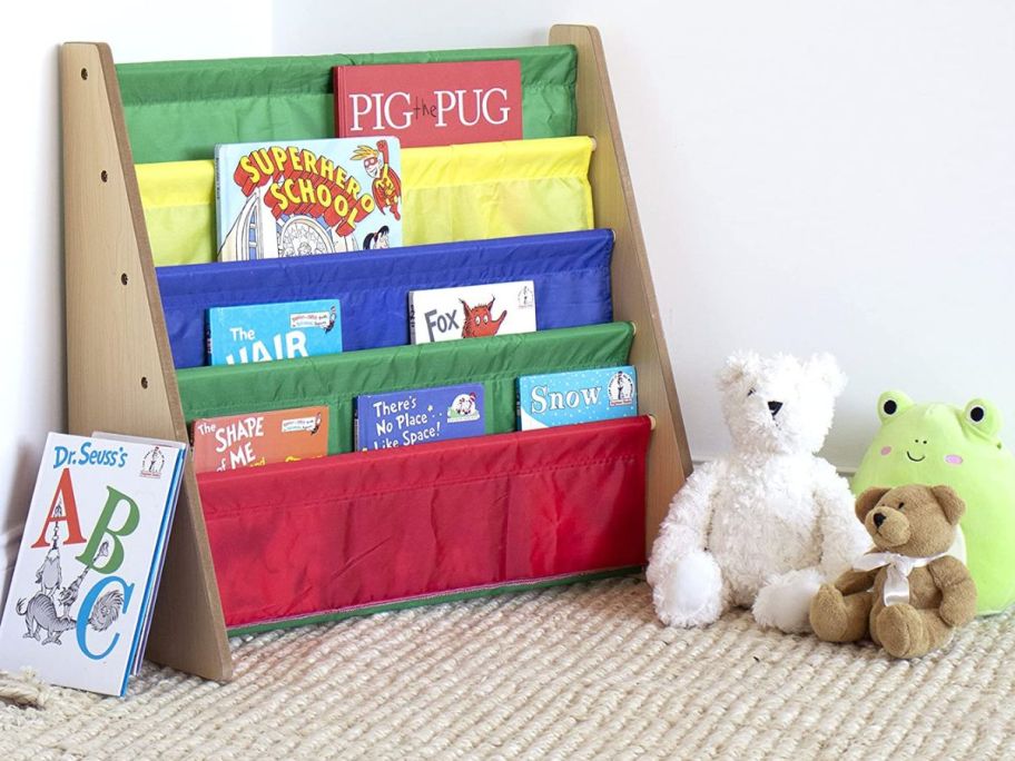 Coloful kids bookshelf with toys next to it