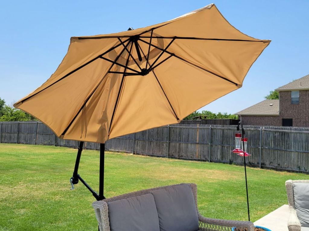 umbrella outside by a chair