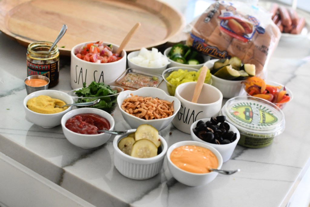 putting condiments in small bowls