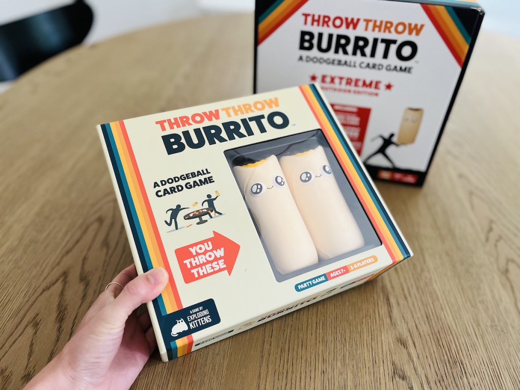 two throw throw burrito games on wood table