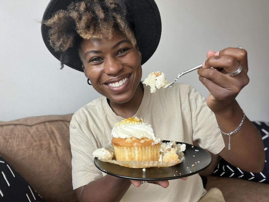 woman with Costco Mini Lemon Cakes with Buttercream Icing