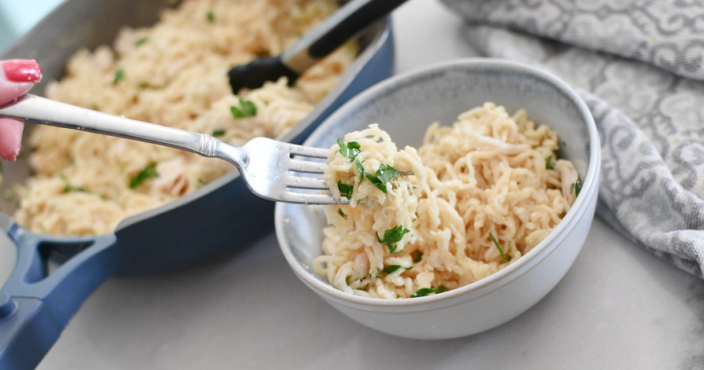 alfredo ramen in a bowl