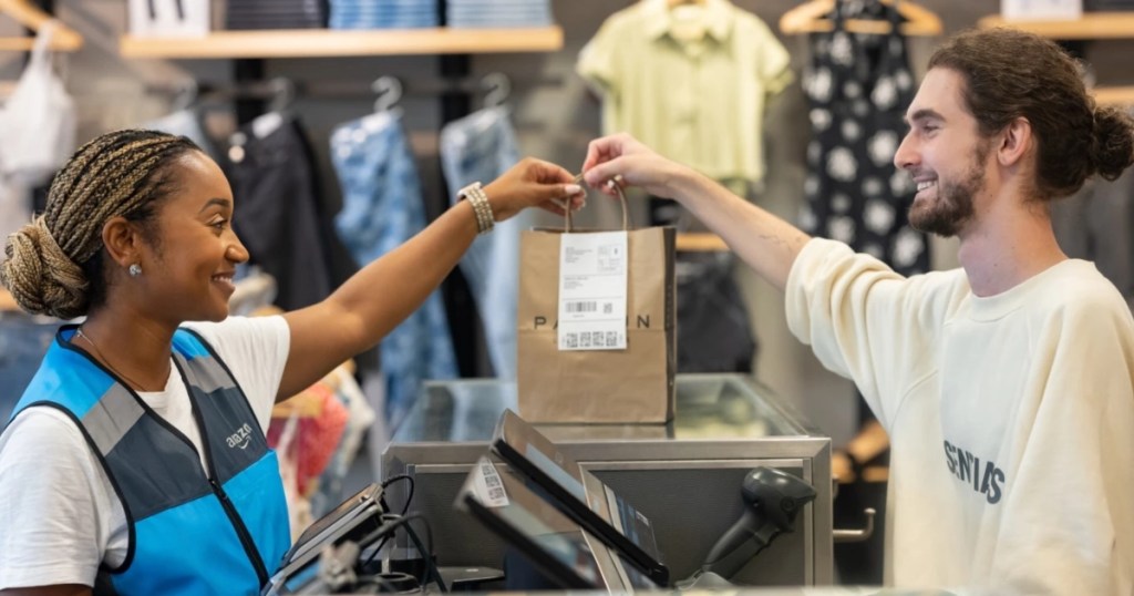 Amazon employee picking up retail order