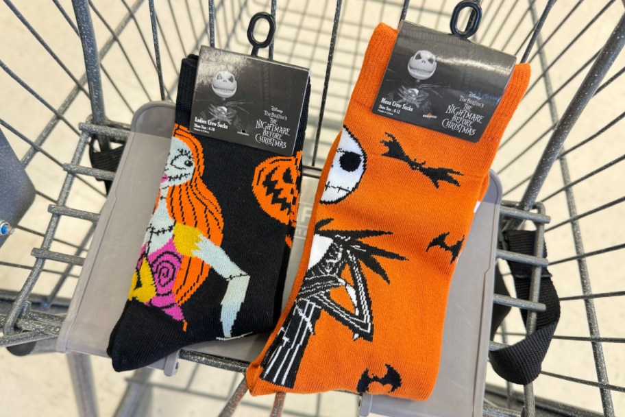 hand holding Disney The Nightmare Before Christmas Crew Socks in shopping cart