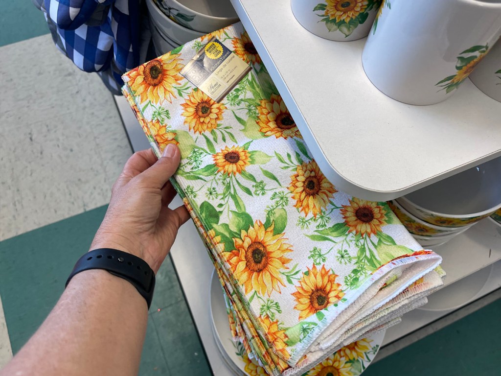 hand touching sunflower hand towels