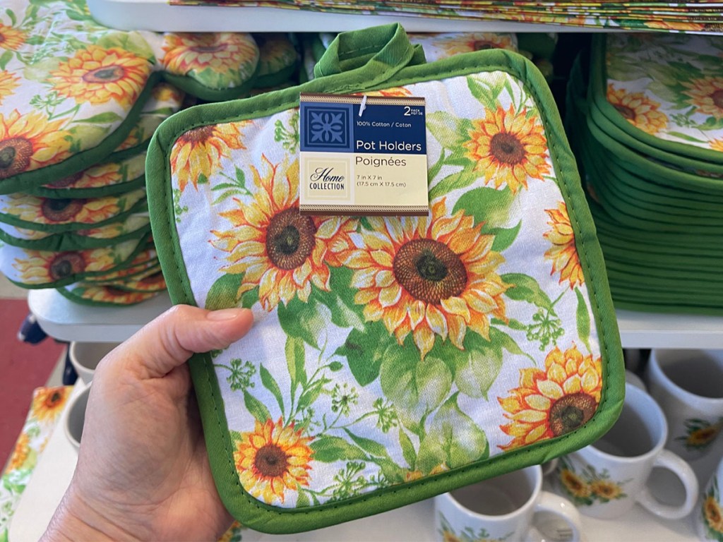 hand holding sunflower pot holder