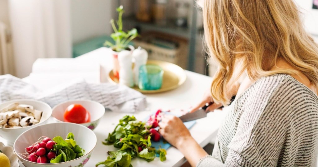 woman cutting food