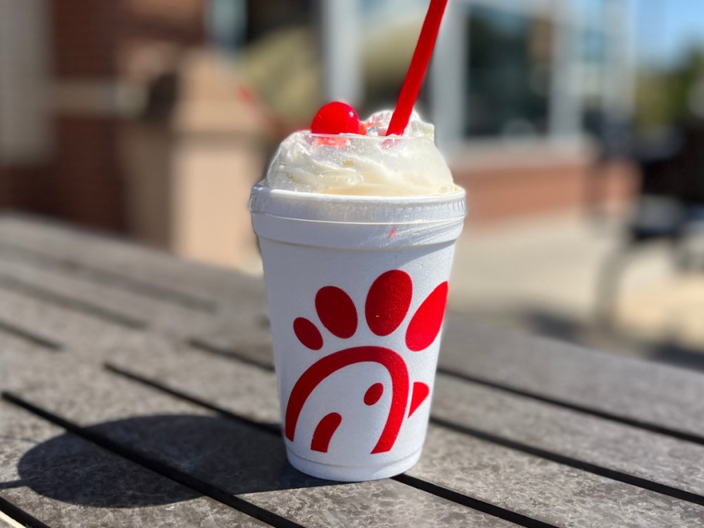 Chick-fil-A milkshake on outdoor restaurant table