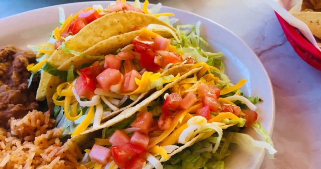 a plate of tacos and mexican food