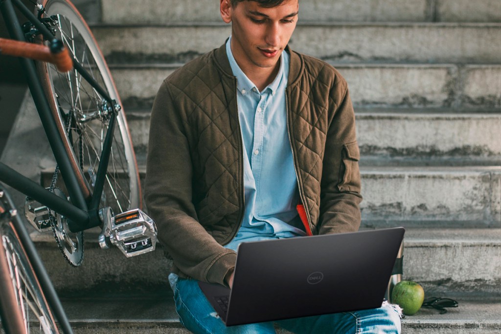 College student working on Dell Laptop