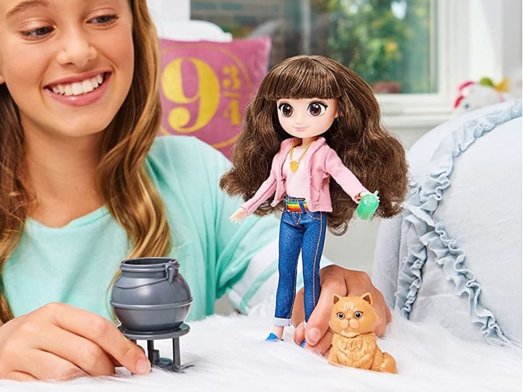 girl playing with a Hermione Gift Set