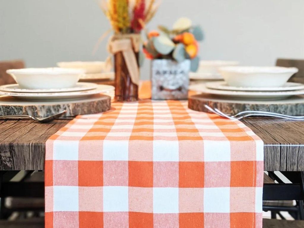 orange and white check table runner