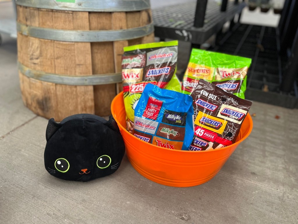 Halloween candy in an orange bucket