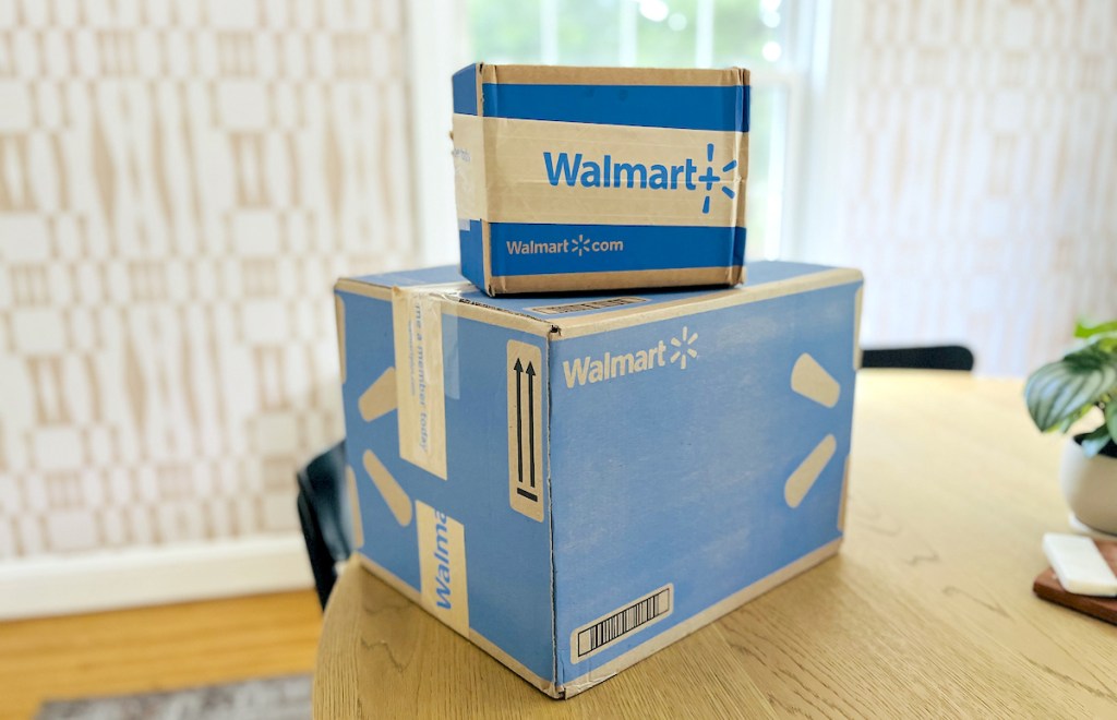 walmart boxes stacked on wood table