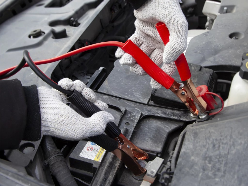 jumper cables on car