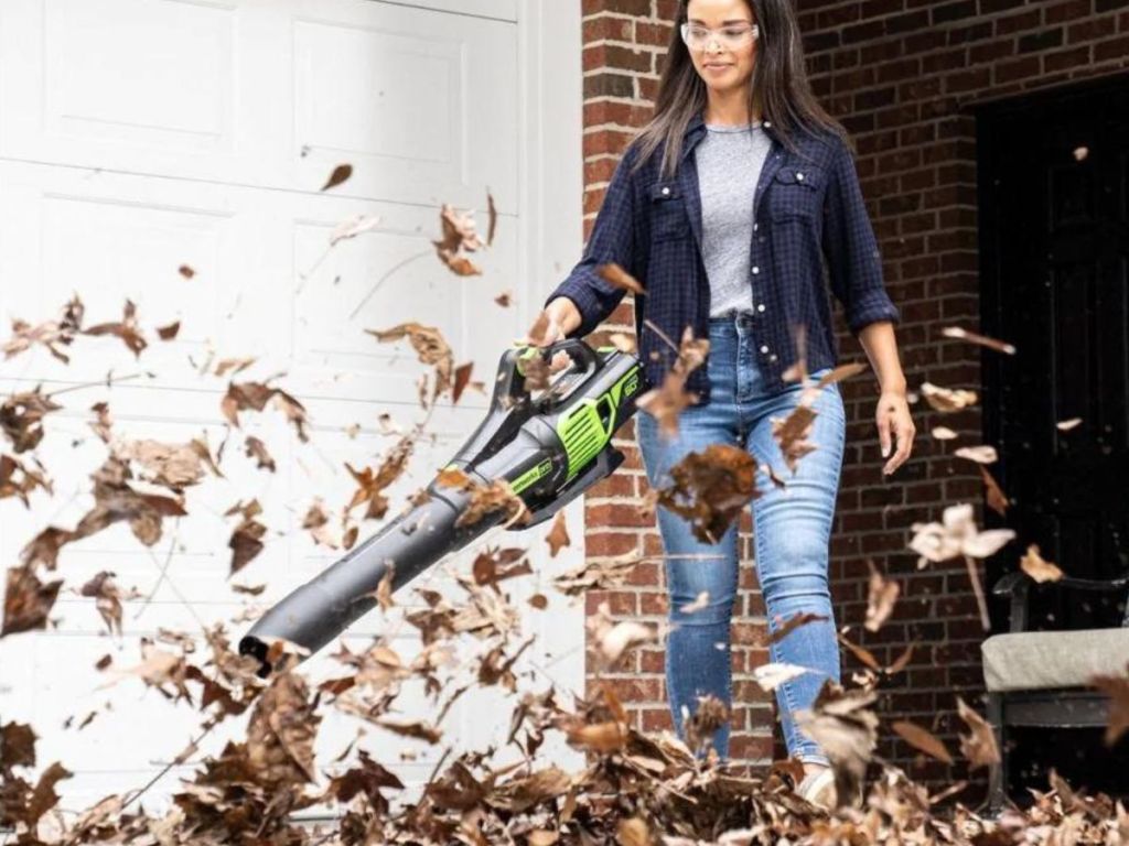 woman using a Greenworks Leaf Blower