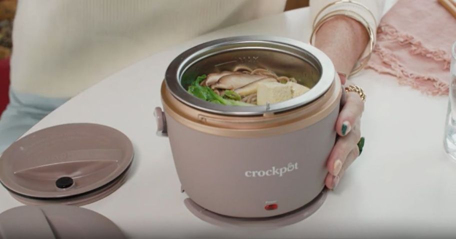 woman eating from a Crockpot™ 20-oz. Lunch Crock Food Warmer