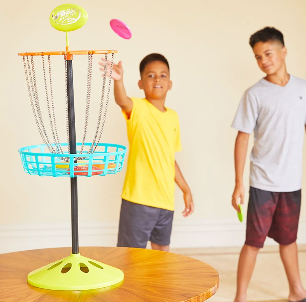 kids playing with mini frisbee golf set