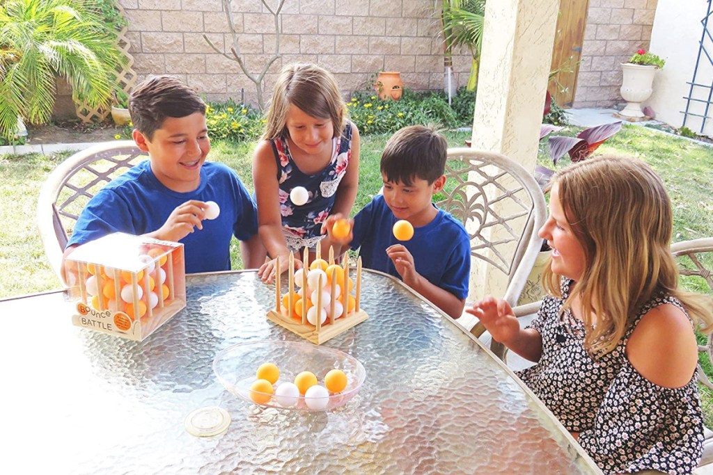 kids at a table playing bounce battle