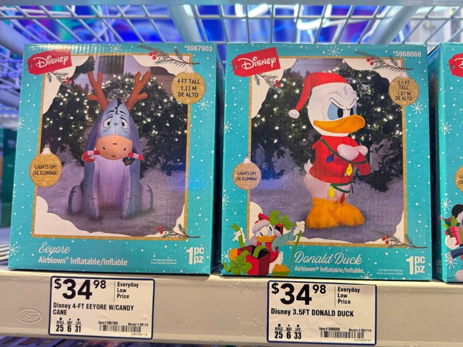 disney eeyore and donald duck christmas inflatables in box in store