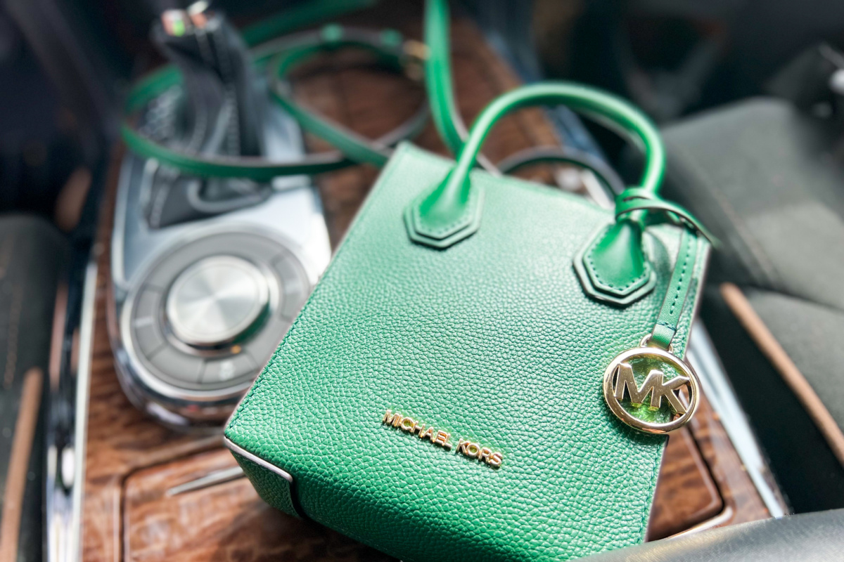 green purse in car