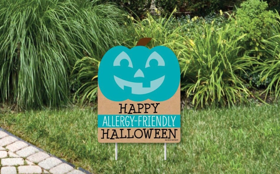 happy allergy friendly halloween lawn sign in grass