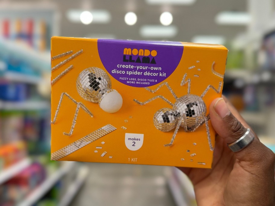 hand holding a Halloween Disco Spider Kit