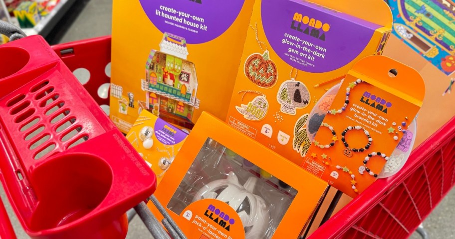 Mondo Llama Halloween activity kits in a Target cart