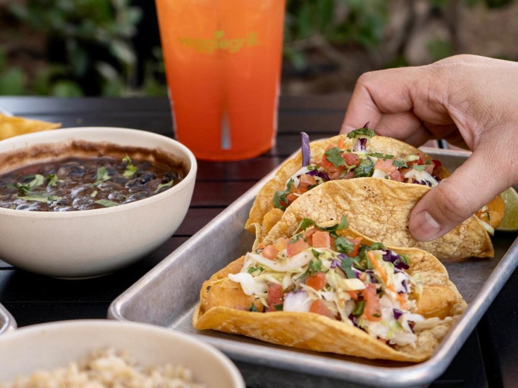 two fish tacos on a rectangular tray