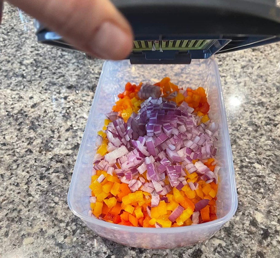 vegetables inside a mueller vegetable chopper, one of the cool kitchen gadgets for cooks