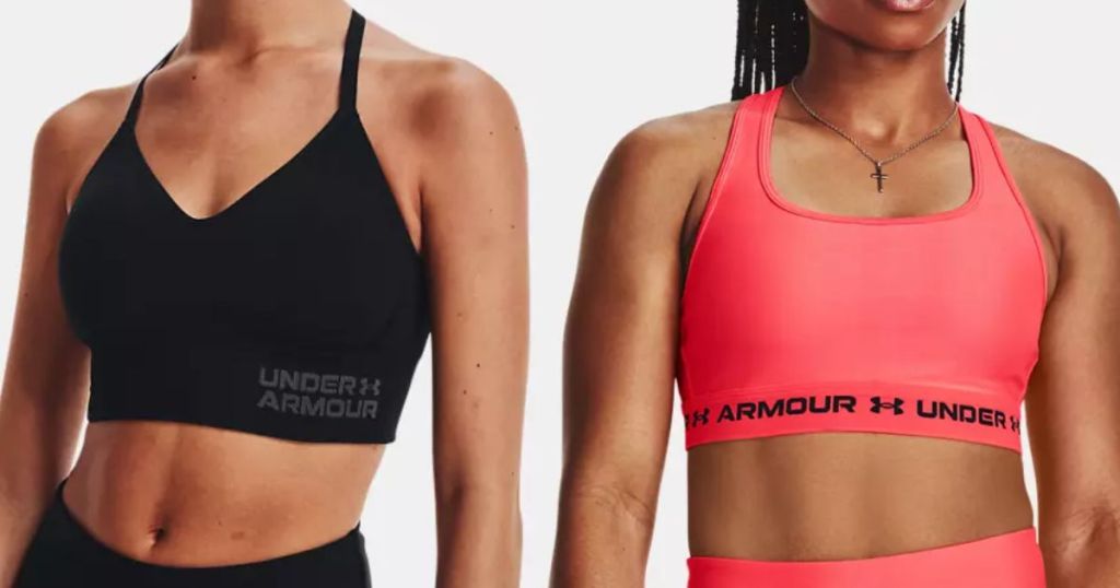 woman wearing a black Under Armour sprots bra and woman wearing a coral color Under Armour sports bra