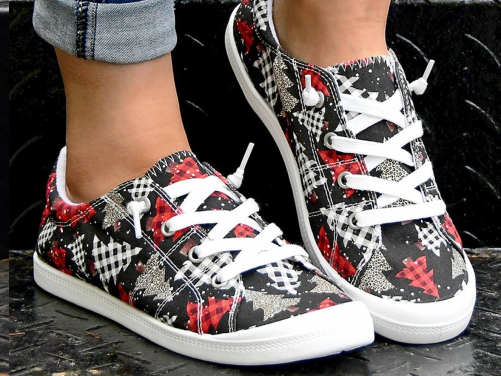 woman waering Black & White holiday sneakers