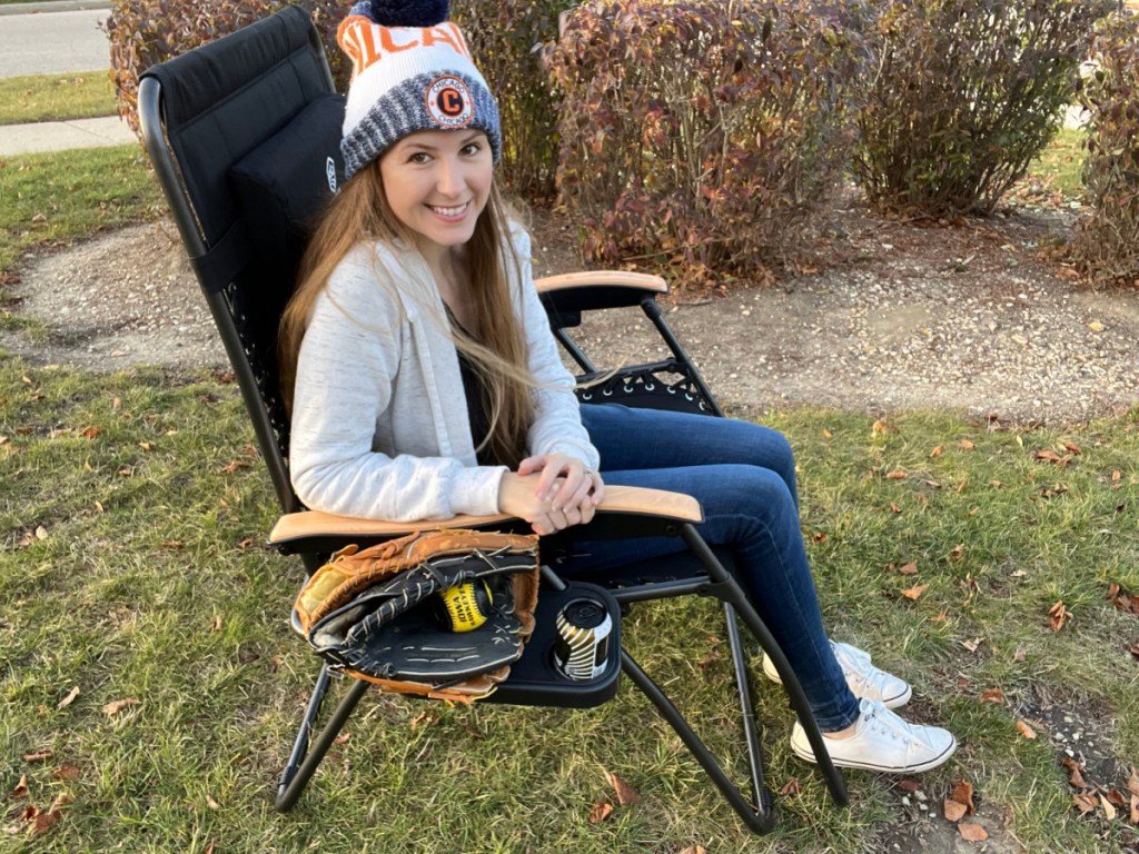 woman Sitting in a Zero Gravity Chair With Detachable Side Table