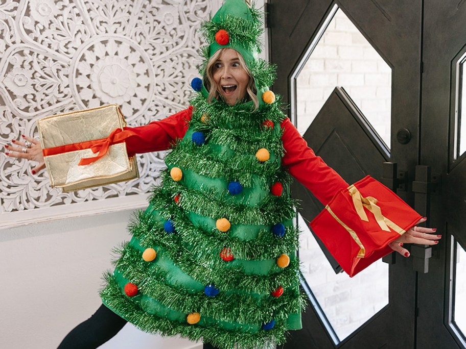 woman in a green christmas tree dress