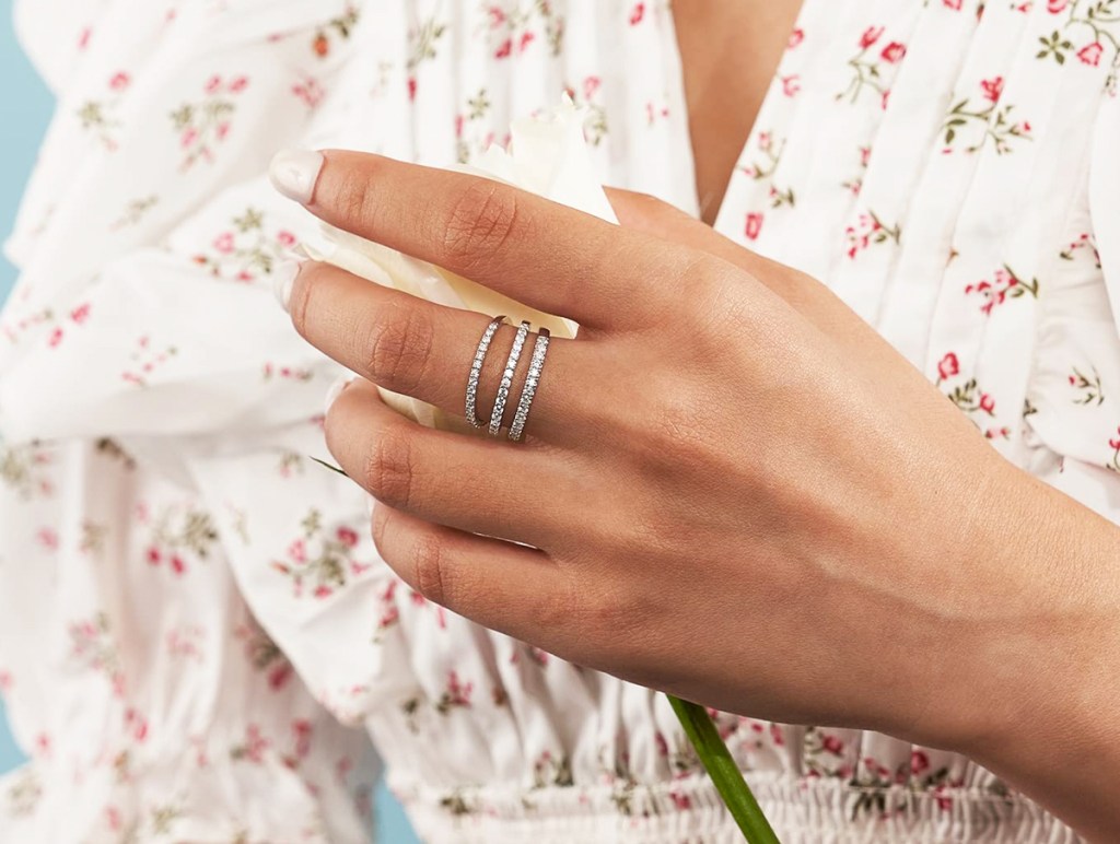 woman wearing 3 rings