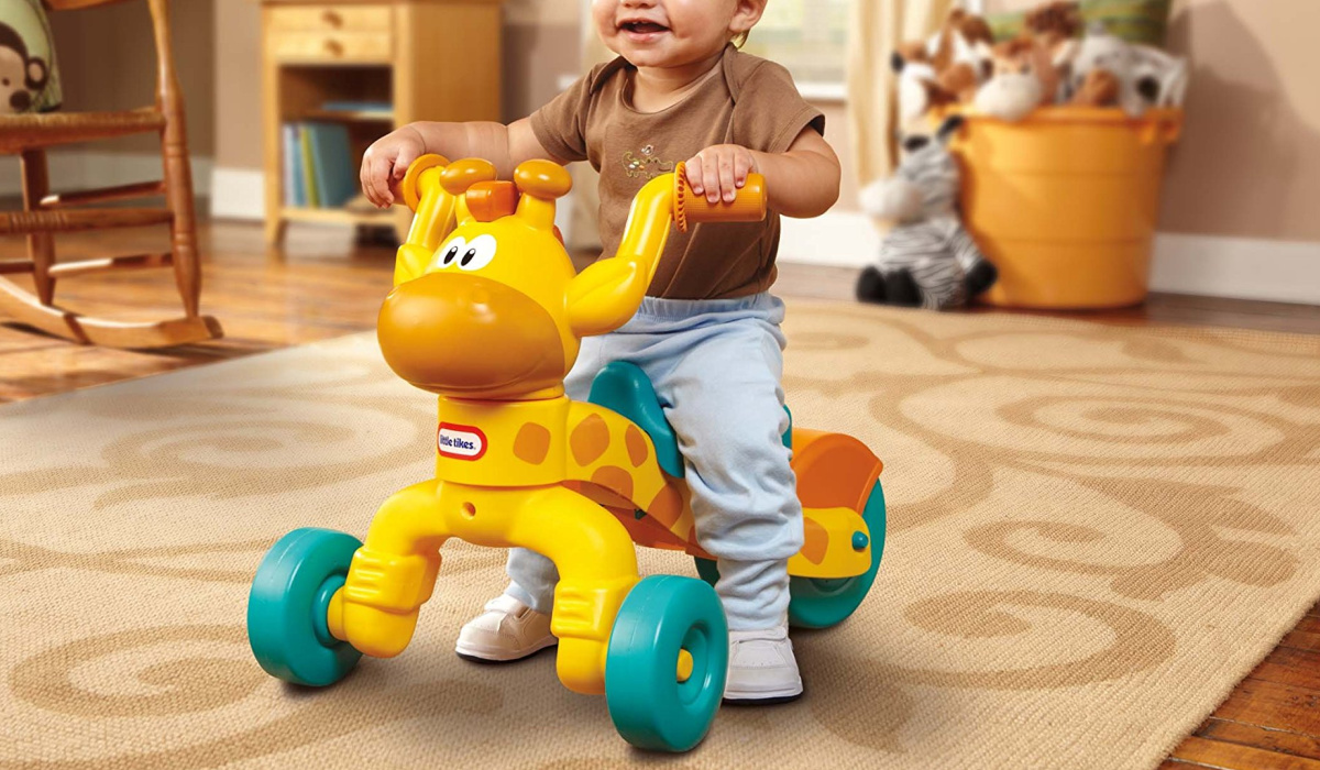 baby on Little Tikes Go and Grow Lil' Rollin' Giraffe