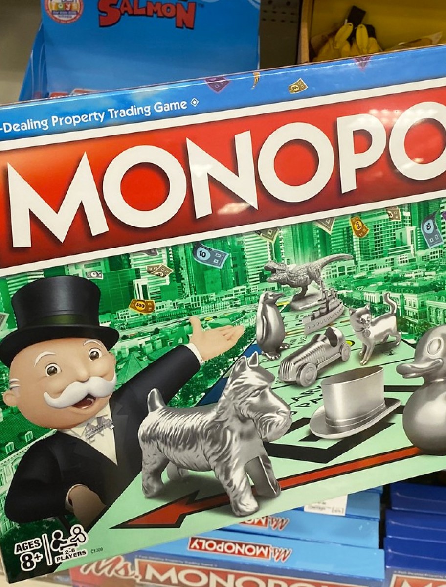 hand holding monopoly board game