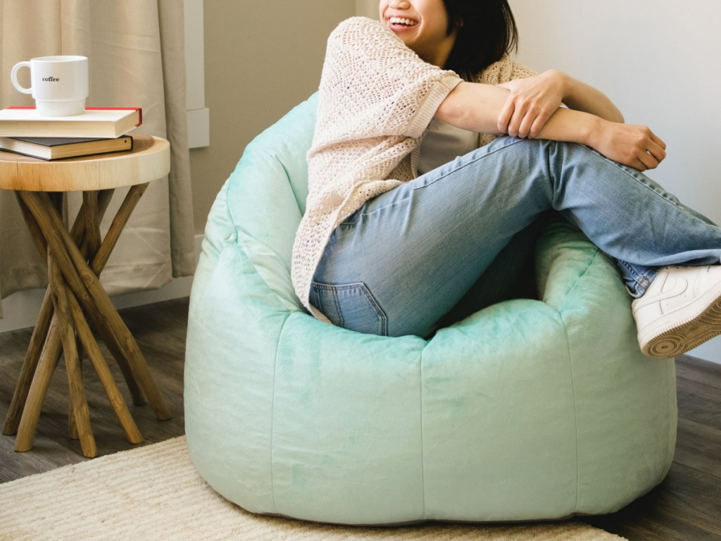 girl sitting on blue Big Joe Joey Bean Bag Chair