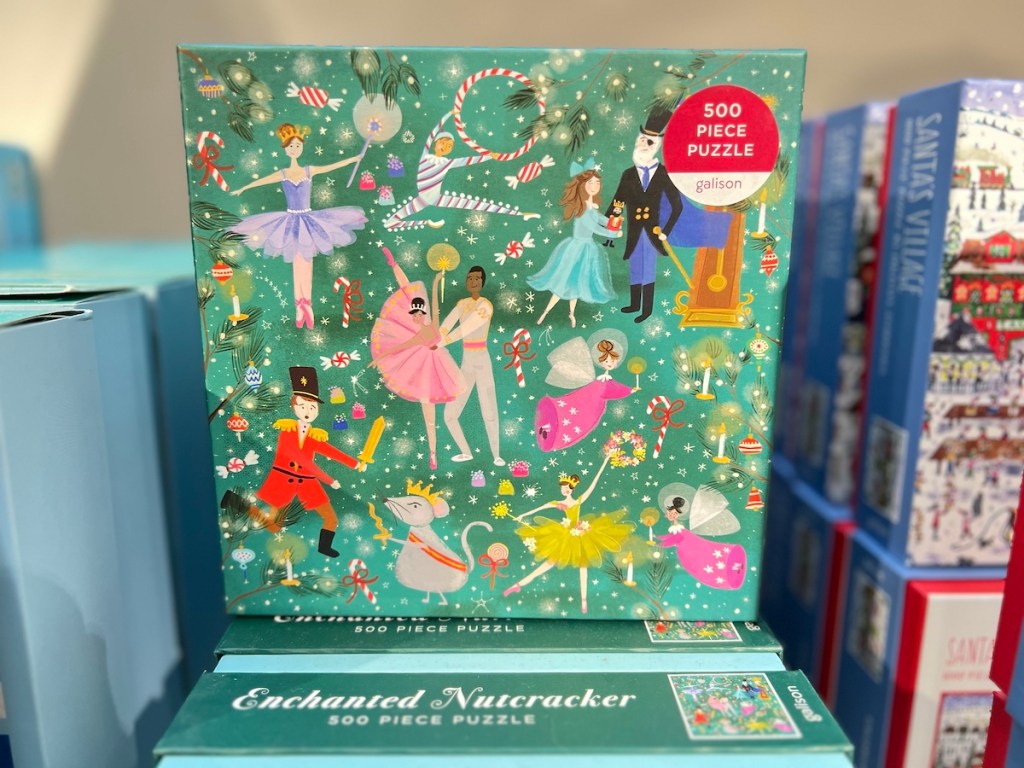 pile of christmas nutcracker puzzles on store shelf