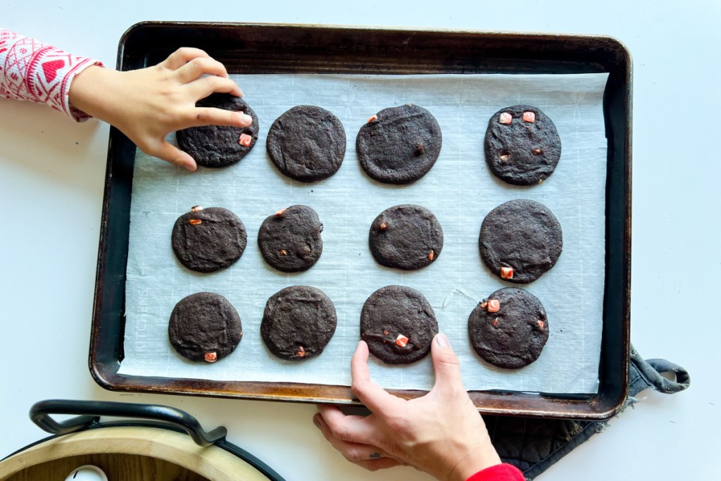 hands grabbing cookies