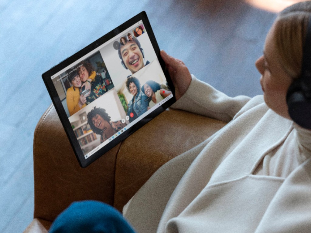 woman holding surface pro 7