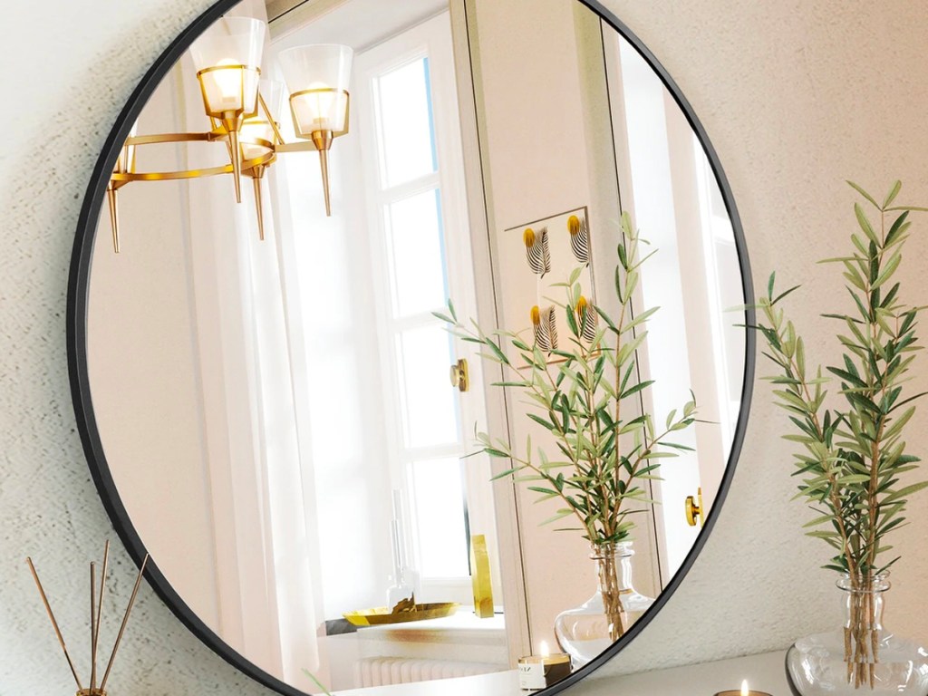 black round wall mirror