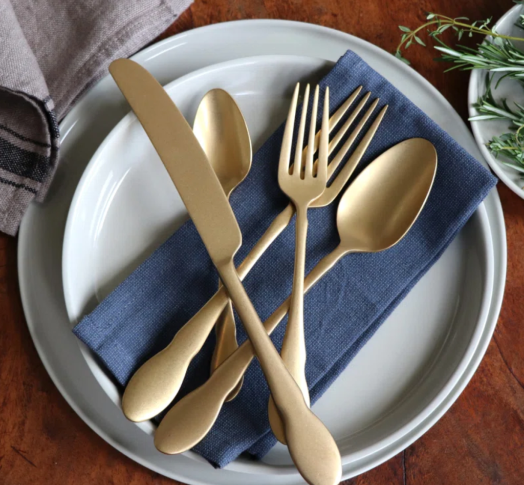 Ebony Gold Flatware set on a plate