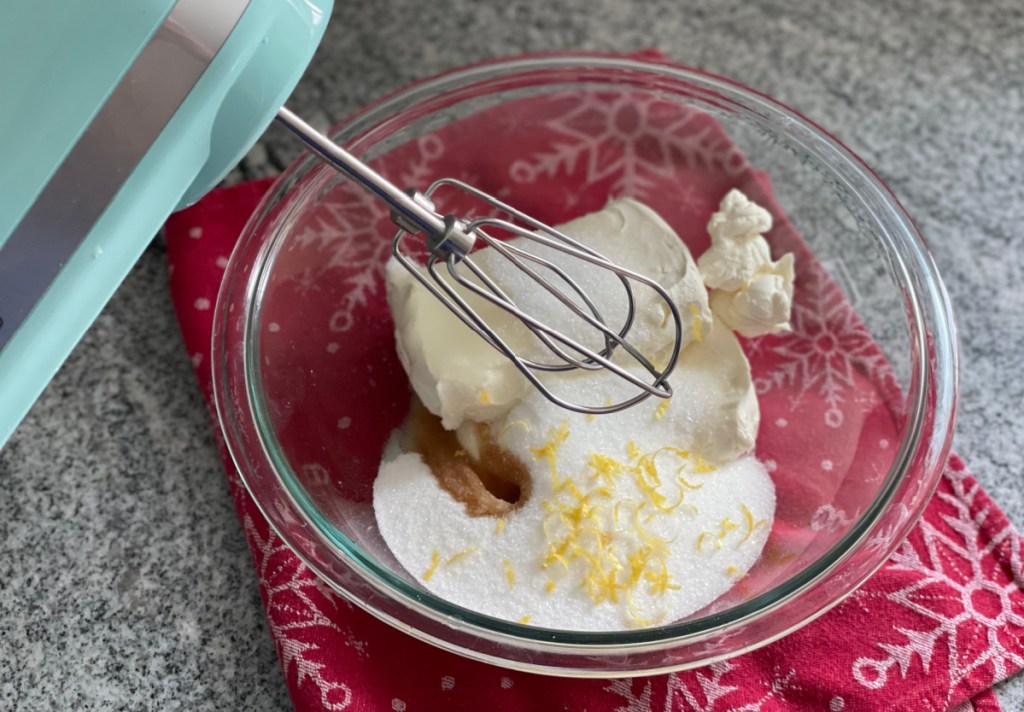 Ingredients for Sopapilla Cheesecake Bars in a mixing bowl