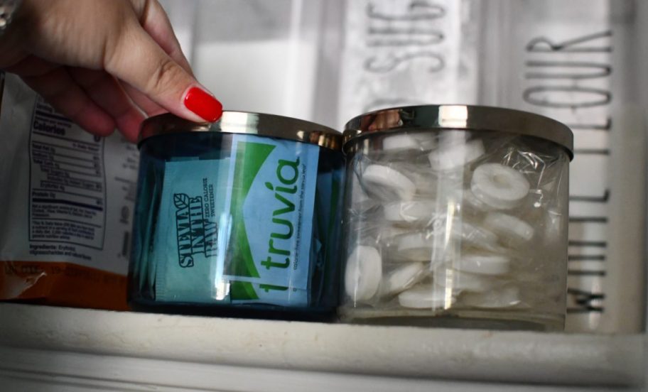 Reusing candle jars to hold mint candies and sugar substitute packets