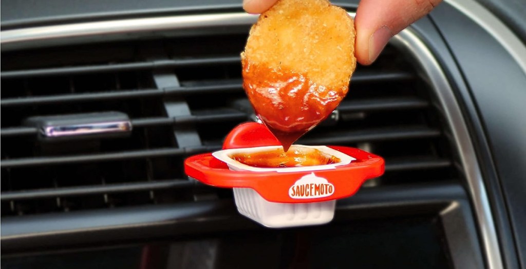 A saucemoto dip clip for the car makes a unique white elephant party gift