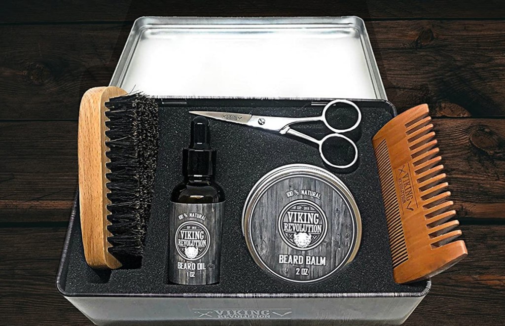 Tin box with scissors, onlineb, brush, and beard oil