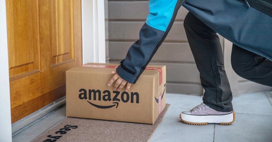 person delivering amazon box