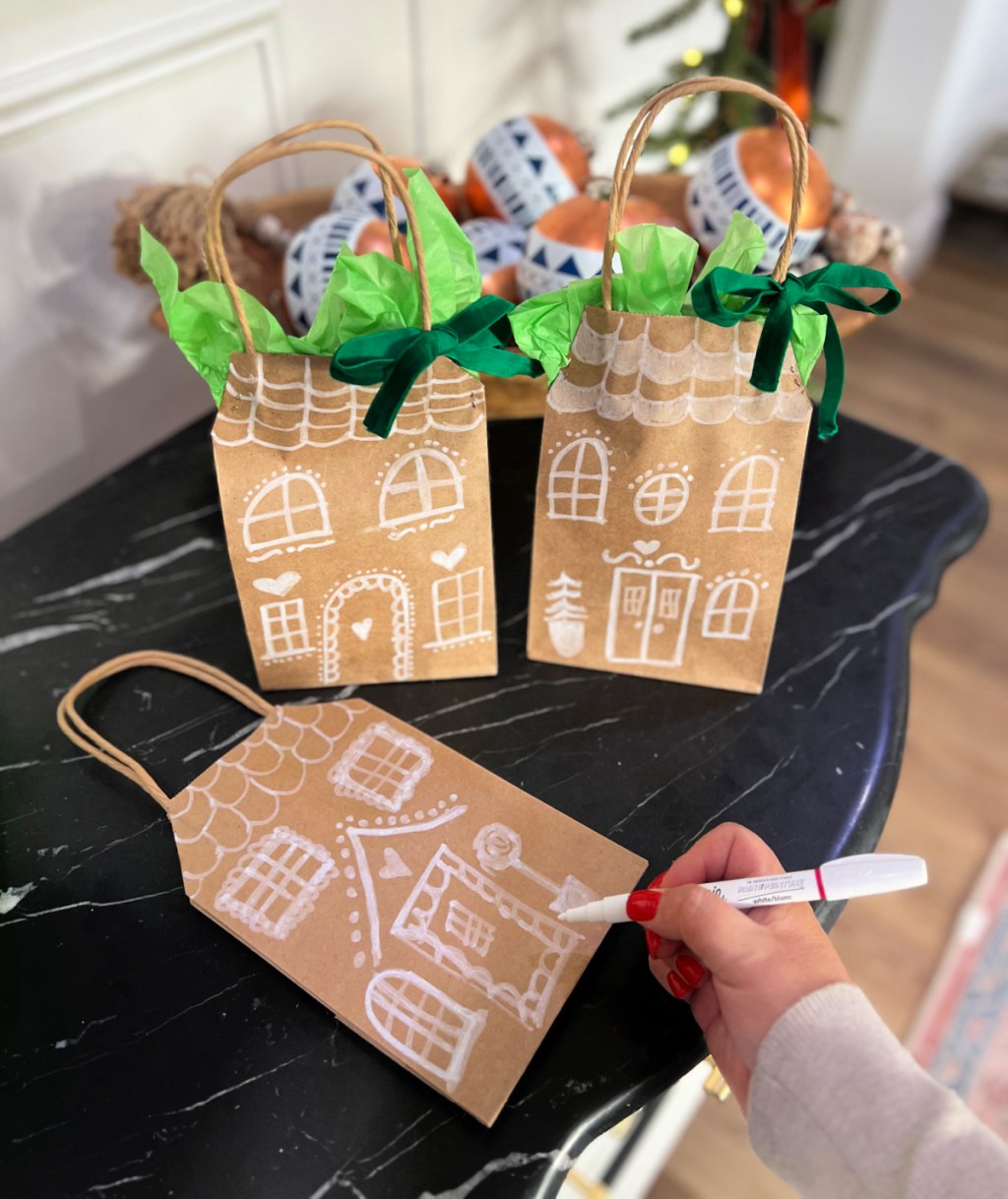 creating gingerbread gift bags with a white paint pen