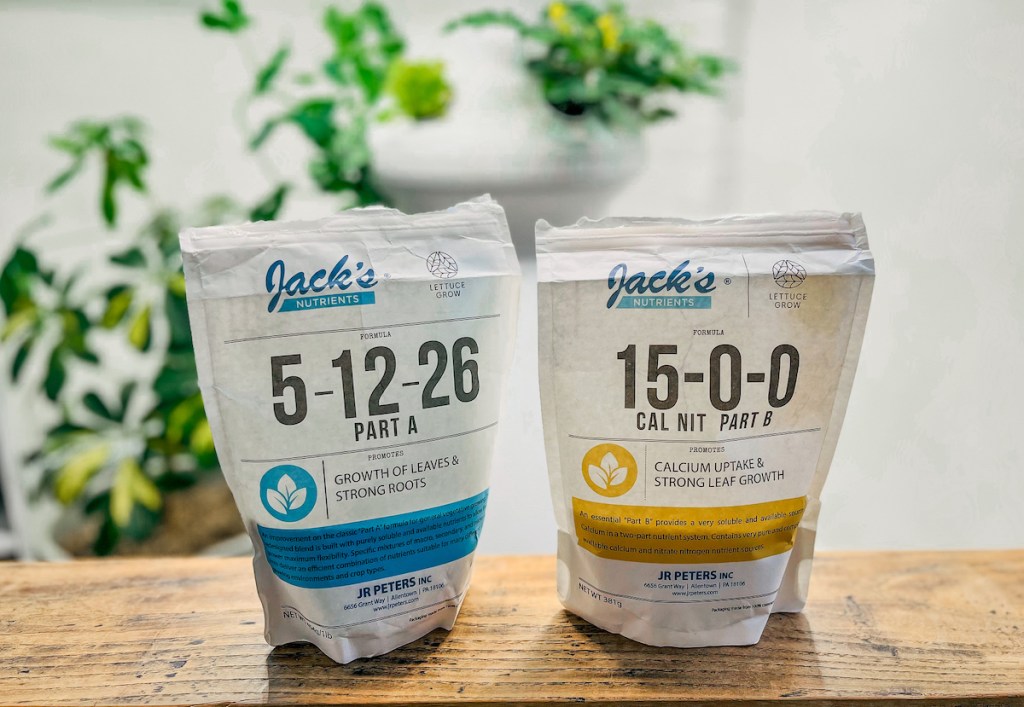 bags of jacks nutrients on wood table